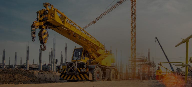 Truck with crane on jobsite